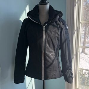 Rossignol women’s black Control ski jacket with removable faux fur hood.